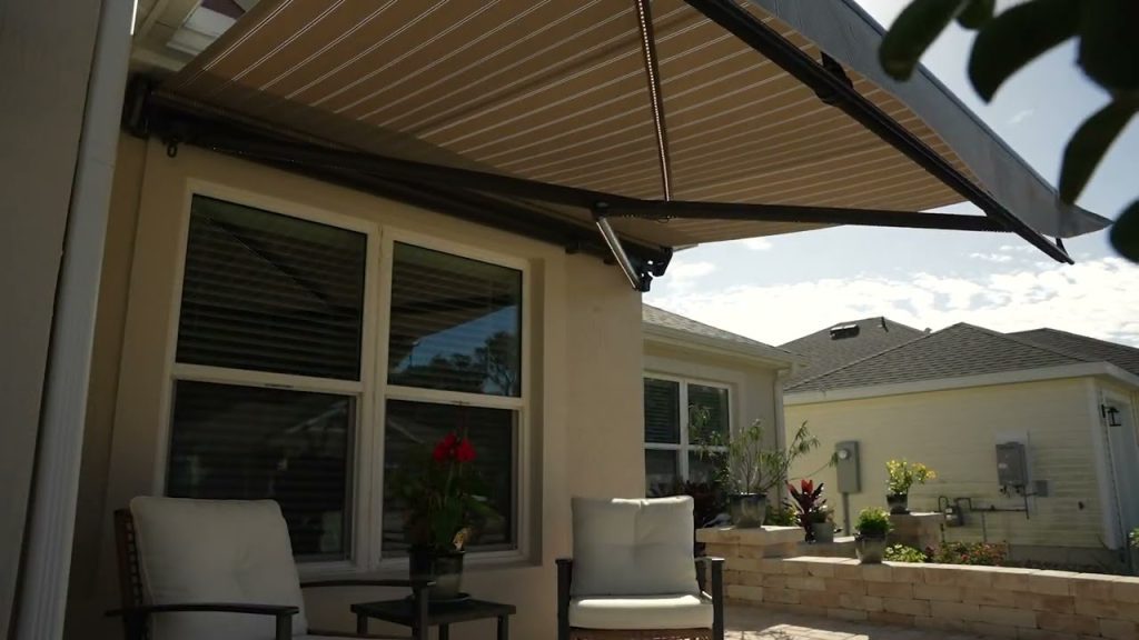 beige retractable awning small home porch