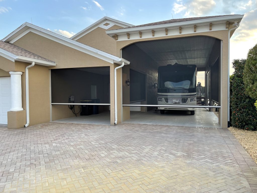 motorized screen with bus in garage